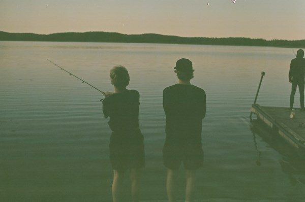 People fishing from a dock